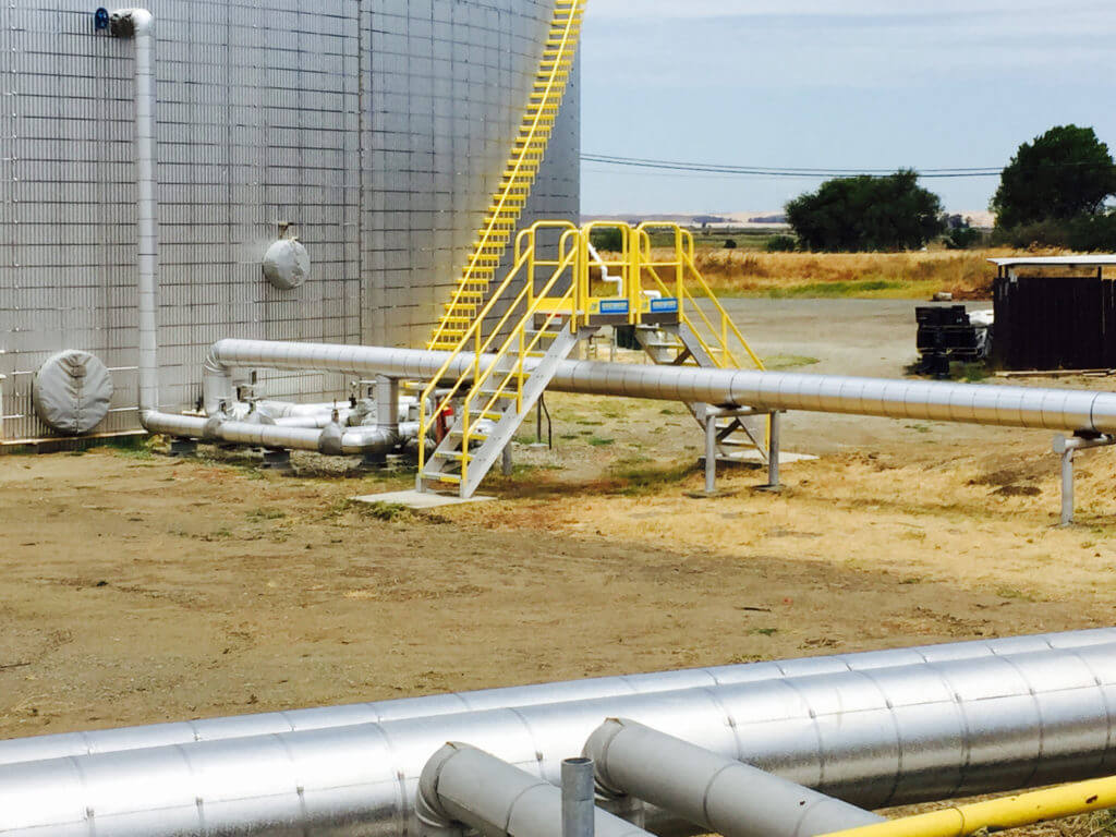 Erectastep NuStar pipe crossover stairs by tanks